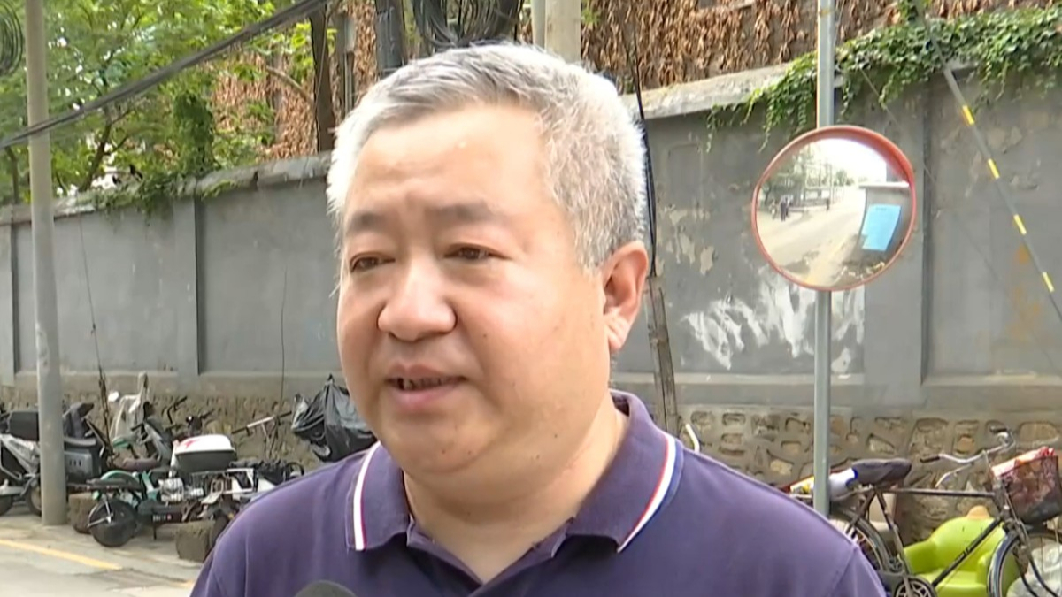 “大家商量着办”解决积水难题 海淀区坚持开门教育办实事